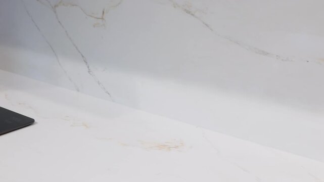 Trendy quartz white stone with luxury marble background texture. Kitchen countertops with modern interior design and counters. 