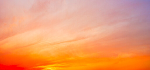 Beautiful bright dramatic sunset sky wide panorama view