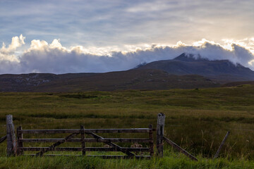 Fototapeta premium Remote Scottish moors in the most northern part of Scotland during blue hour just before sunset with pink and purple hues.