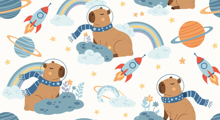 Whimsical seamless pattern with cute capybara astronauts floating in space among rockets planets rainbows and stars for kids.