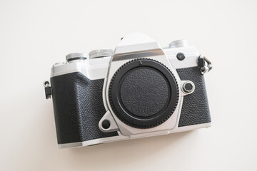 Modern digital camera with a vintage look, front view