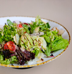 Fresh green salad with leaves and vegetables. High quality photo