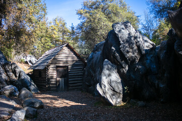 The Columbia State Park looking at the exposed rock from the strip and water jet mining that was used to expose gold ore and a cabin