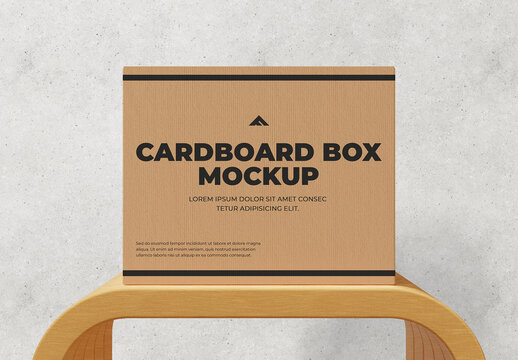 Large Corrugated Cardboard Shipping Box Mockup on a Wooden Surface
