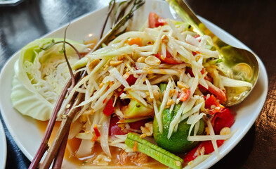Spicy, sour, sweet papaya salad