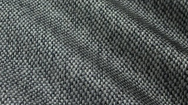 Microgrid woven texture waves shifting through gray blend tones featured in an exclusive geometric abstract background