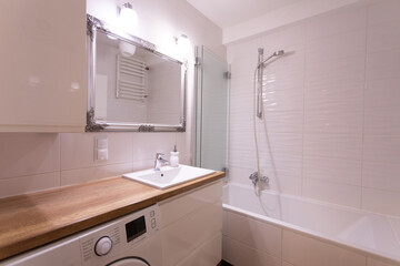 Stylish and Contemporary Modern Bathroom Interior Featuring a Luxurious Bath and Sink