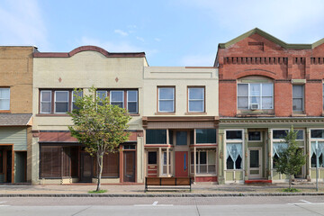 Facades of old fashioned small town main street buildings