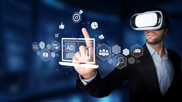 A businessman wearing a virtual reality headset engages with digital marketing visuals, showcasing innovation in technology and the future of business interactions. Raster