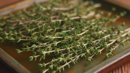 Fresh thyme herbs on a rustic tray, ready for culinary use, evoking freshness, flavor and aromatic essence