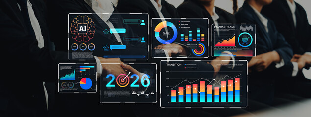 A group of business professionals engages with digital interfaces that display intricate data analytics and financial metrics, highlighting innovation and teamwork in a corporate setting. Trope