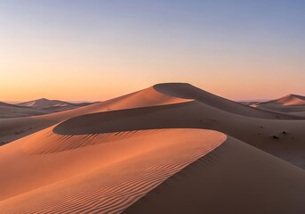 Serene desert vista featuring majestic sand dunes under soft twilight skies creating a scenic representation
