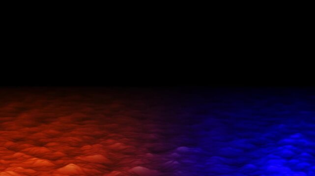 Cinemagraph of the red and blue sea surface with rolling waves and ripples on dark background. Aerial front view. Natural loopable seamless background