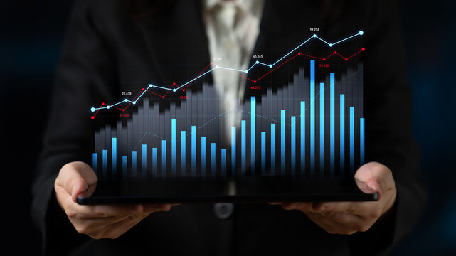 A professional data analyst showcases business growth trends using a tablet. Dynamic charts and graphs demonstrate performance metrics in a modern office setting. Scalp - Powered by Adobe