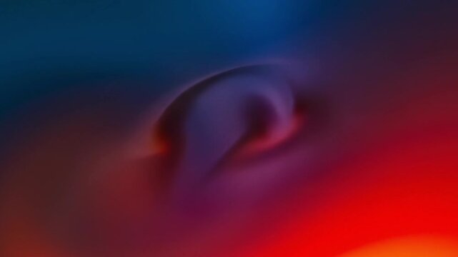 A mesmerizing and vibrant abstract background featuring a seamless gradient of rich blues, deep purples, fiery reds, and warm oranges. The fluid motion creates a dynamic and ethereal visual experience