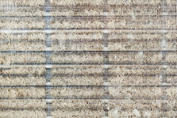 Air conditioner cooler clogged with dust, dirty refrigerator radiator