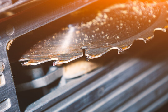 Hand-held circular saw for cutting boards, close-up