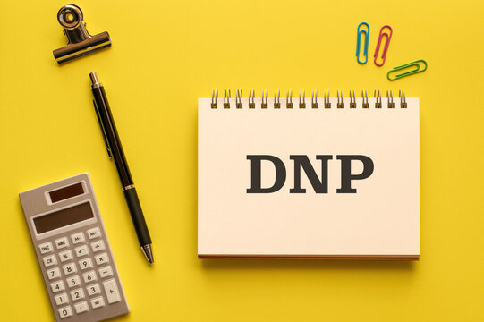 There is notebook with the word DNP. It is an abbreviation for Distributed Network Protocol as eye-catching image.
