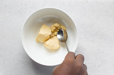 Overhead view of nigerian akamu or pap paste, process of making akamu, flatlay of process of making nigerian akamu ogi pap or corn pudding