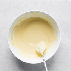 Overhead view of nigerian akamu or pap paste, process of making akamu, flatlay of process of making nigerian akamu ogi pap or corn pudding