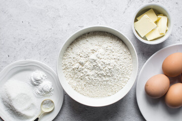 Overhead view of mise en place of ingredients for making Nigerian egg roll, flatlay of ingredients for making african egg roll, process of making egg rolls