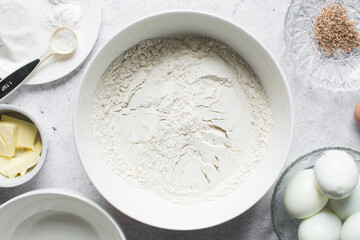 Overhead view of mise en place of ingredients for making Nigerian egg roll, flatlay of ingredients for making african egg roll, process of making egg rolls