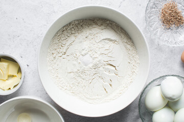 Overhead view of mise en place of ingredients for making Nigerian egg roll, flatlay of ingredients for making african egg roll, process of making egg rolls