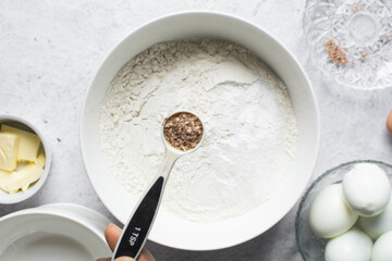 Fototapeta premium Overhead view of freshly grated Nutmeg in a teaspoon