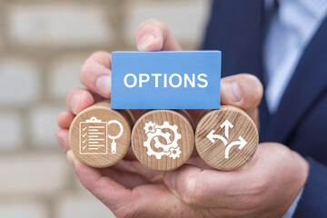 Choice different options business planning concept. Business person using virtual touch screen sees the word OPTIONS.