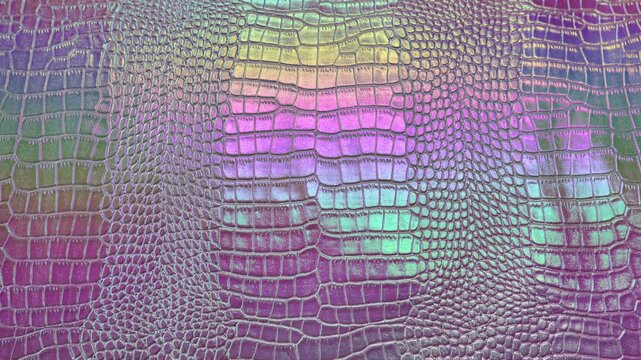 Metallic shiny crocodile leather. animalistic fashion prints.Crocodile texture gradient of pink, purple, lilac and blue colors. 4k footage