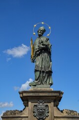 Obraz premium Czech Republic, Prague September 6, 2025 The statue of John of Nepomuk on the Charles Bridge in Prague
