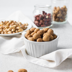 Coated peanuts or cracker peanuts on a white granite countertop