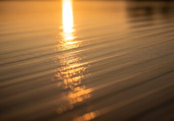Golden hour serenity at sea surface, capturing the light and soft motion