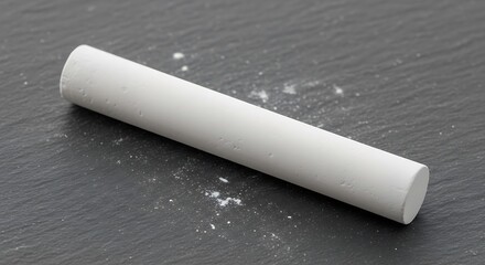Single White Chalk Piece on Slate Surface Close-up Photography