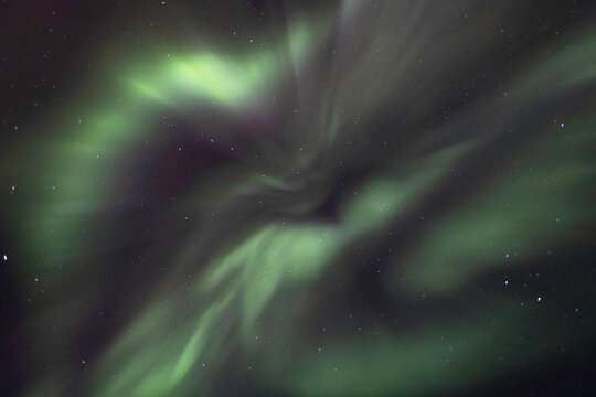 Stunning Aurora Borealis Over Night Sky With Green Swirls 