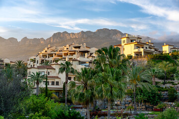 Residential buildings on the coast of Spain at sunset
