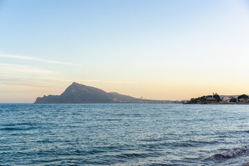Altea coastline landscape with Sierra Helada mountain at sunset