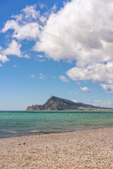 Altea bay beach with Sierra Helada mountain and turquoise water
