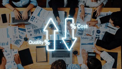 Diverse team members engage over data and graphs to find the best balance between quality and cost...