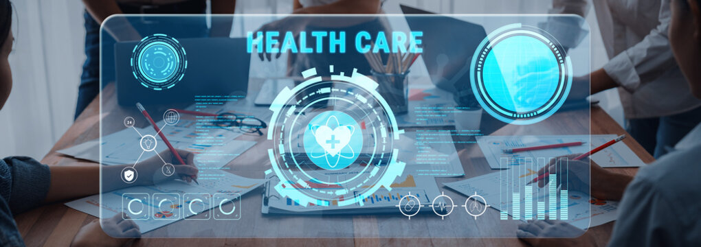 A modern workspace showcasing a digital health care interface. Professionals collaborate using data-driven insights, enhancing patient care and medical efficiency. Trope - Powered by Adobe