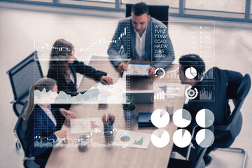 A group of professionals engage in a business meeting focused on data analysis and strategy planning in a modern office setting. Graphs and charts illustrate key insights. Impute