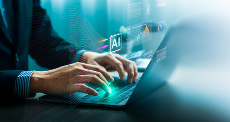 Businessman typing on laptop with digital AI interface and futuristic data dashboard, symbolizing artificial intelligence, big data analytics, machine learning, innovation, modern business technology