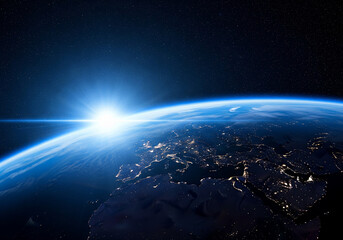 Naklejka premium blue sunrise, view of earth from space