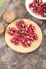 Red Xinjiang Walnut Kernels on Wooden Plate - Premium Healthy Nuts Display