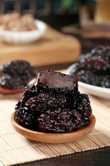 Black Dried Jujube Dates from Shaanxi Province China in Wooden Bowl Traditional Chinese Superfood