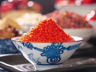 Red Chili Powder Spice in Traditional Blue White Ceramic Bowl Kitchen Cooking Ingredient