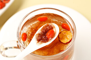 Herbal cornhusk tea with goji berries - traditional wellness brewing for natural health benefits