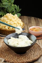 Instant Noodles and Asian Food Ingredients on Wooden Table