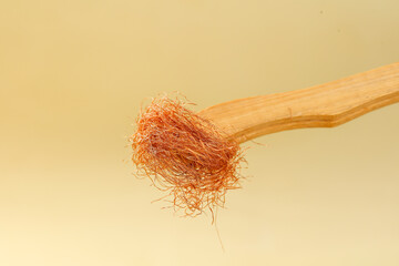 Dried Cornhusk Tea on Wooden Spoon - Natural Herbal Infusion Ingredient