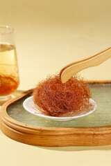Dried Cornhusk Tea Brewing Ingredients with Bamboo Tray and Glass Teapot for Healthy Herbal Medicine